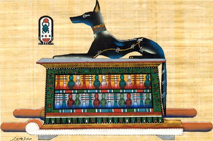 Anubis sur le sarcophage de Toutankhamon.