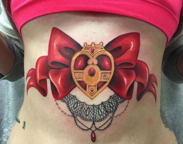 Gros nœud rouge avec collier