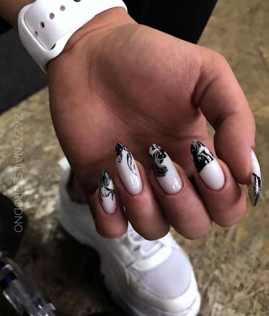 Ongles à impression végétale noire et blanche