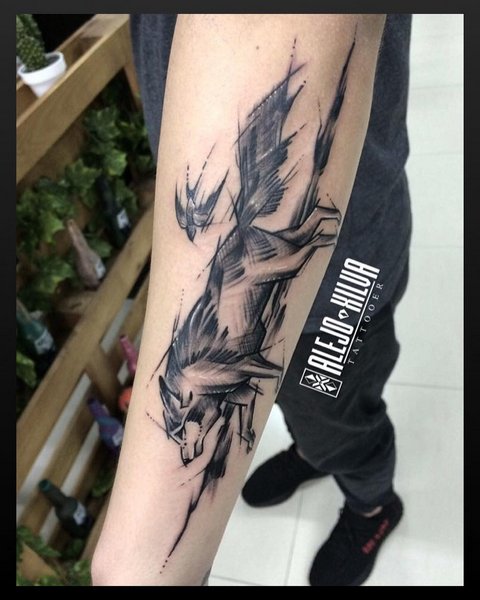 Que signifie le tatouage du loup ? Signification du tatouage de loup pour hommes et femmes : photo