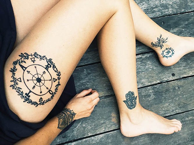 Tatouage de la roue de la fortune. Signification, croquis pour les filles, photos