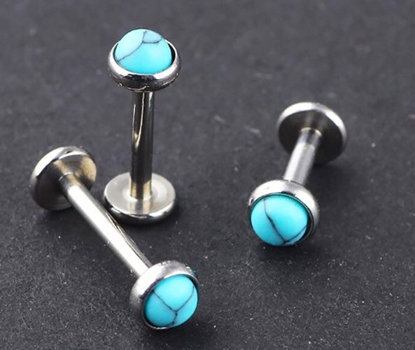 Labret dans l'oreille (boucle d'oreille, bijou de piercing). Qu'est-ce que c'est, photo, où l'acheter