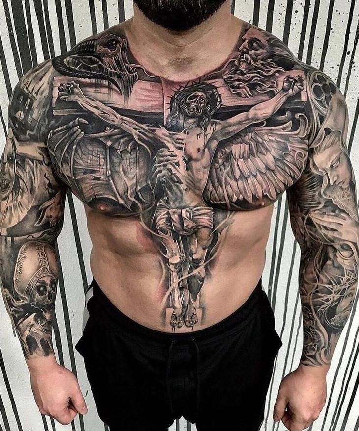 Tatouage homme style horreur poitrine Jésus