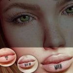 Il y a un tatouage sur la lèvre