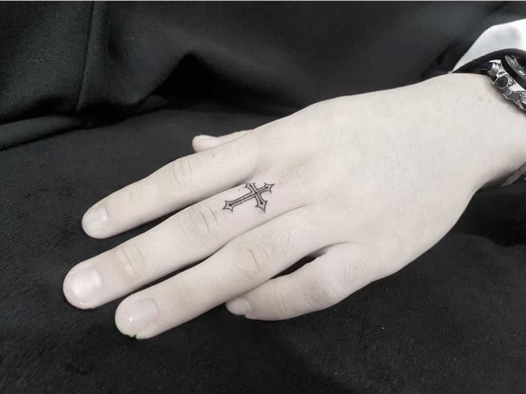 croix sur le pouce