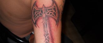 Le tatouage de la hache de Perun