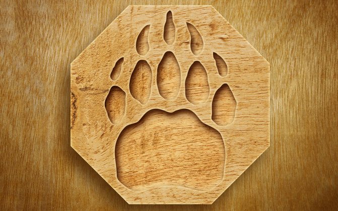 Le symbole de Veles en bois
