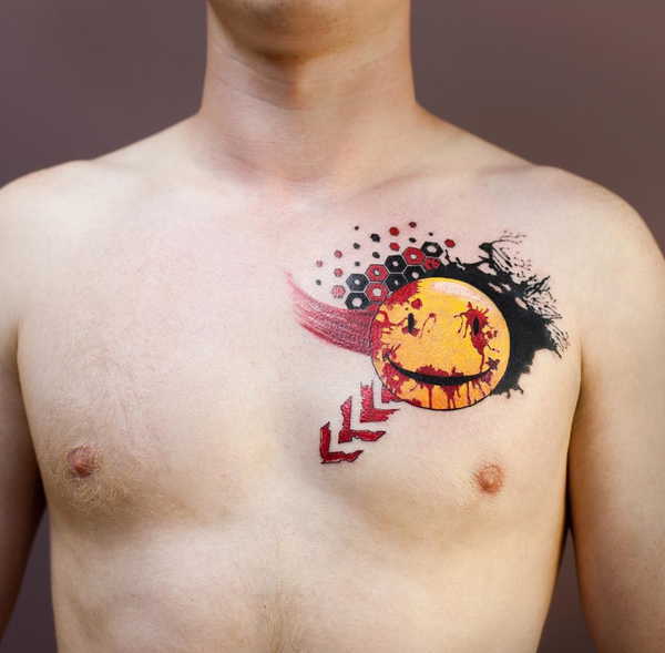 Tatouage d'un visage souriant et d'un point d'orgue.