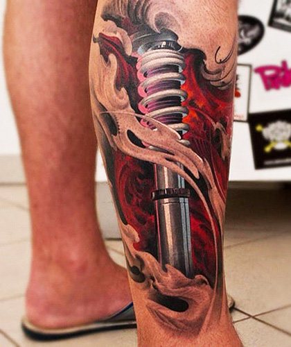 Amortisseur de tatouage sur la jambe. Photo, signification, croquis