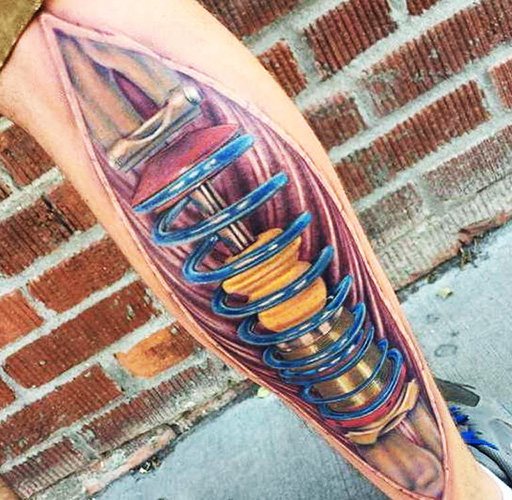 Amortisseur de tatouage sur la jambe. Photo, signification, croquis