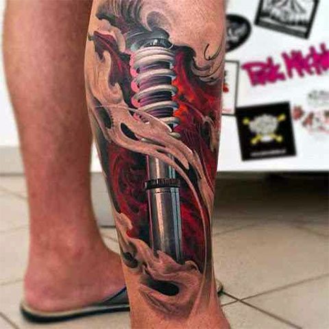 Tatouage de biomécanique sur la jambe - photo