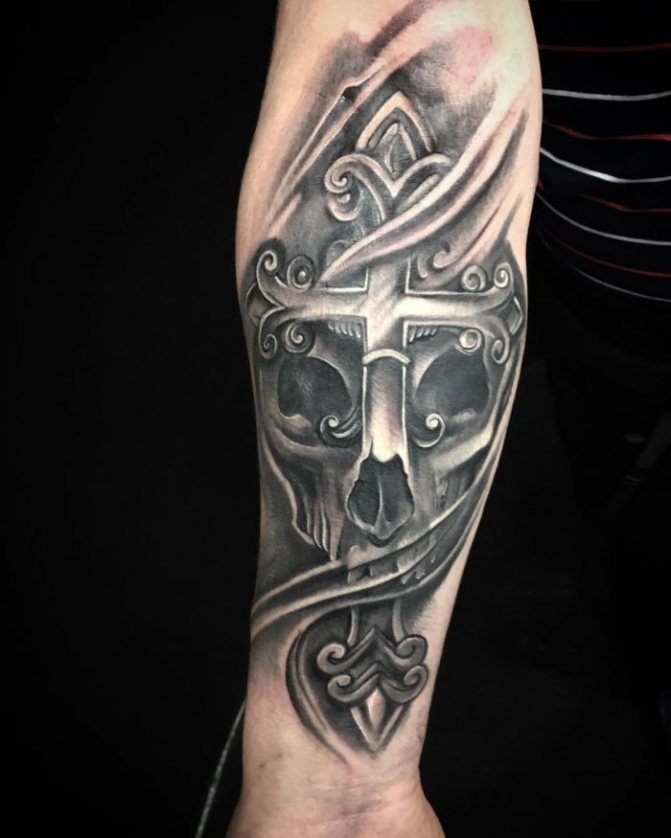 tatouage tête de mort avec une croix