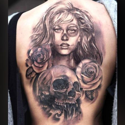 Chikano tatoué sur le dos d'une fille - photo