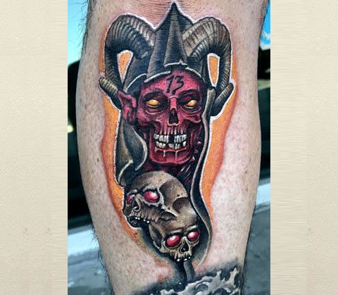 Tatouage d'un démon à pied