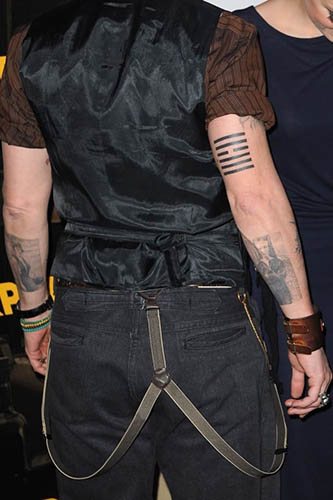 Un tatouage de Johnny Depp. Photos sur son bras, son dos, sa main