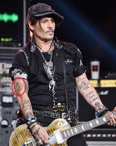 Un tatouage de Johnny Depp. Photos sur son bras, son dos, sa main