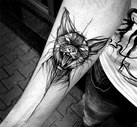 Tatouage de la géométrie sur un bras d'homme