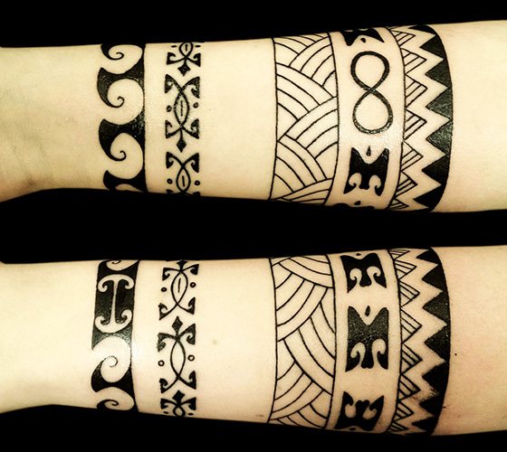 Tatouage maori. Croquis, photo, signification sur l'avant-bras, la jambe, l'épaule, le mollet, la manche