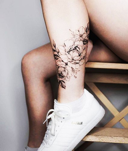 Tatouage sur le mollet pour les filles, les hommes. Croquis, photos, signification