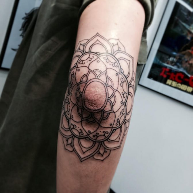 Tatouage sur le coude - Tatouage sur le coude - Tatouage sur le coude - Ornement de tatouage