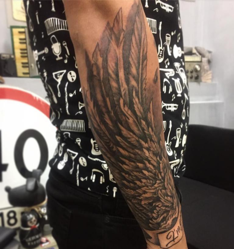 Tatouage sur l'avant-bras pour les hommes