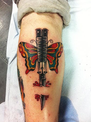 Couteau Tattoo Papillon. Photo, signification, croquis de la rose, l'inscription, une toile d'araignée