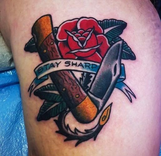 Couteau Tattoo Papillon. Photo, signification, croquis de la rose, l'inscription, une toile d'araignée