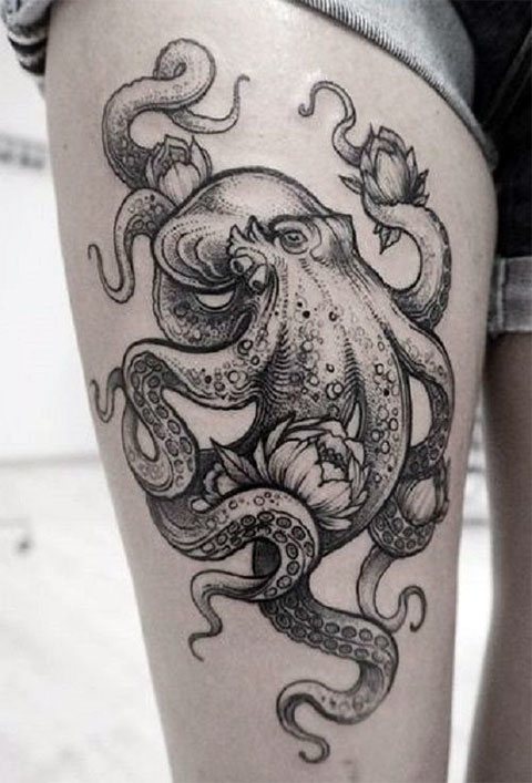 Tatouage d'une pieuvre sur une jambe de fille - photo