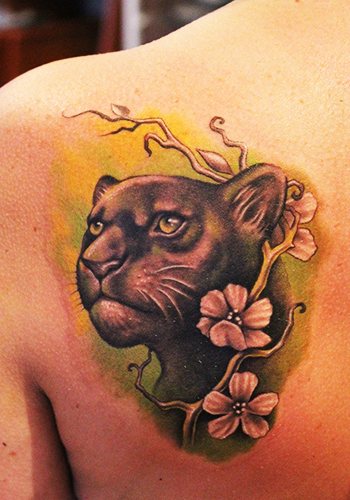 Tatouage de panthère pour les filles. Signification, photo, sur le bras, la jambe, l'épaule, le dos, le bas du dos.