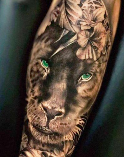 Tatouage panthère pour filles. Signification, photo, sur bras, jambe, épaule, dos, bas du dos