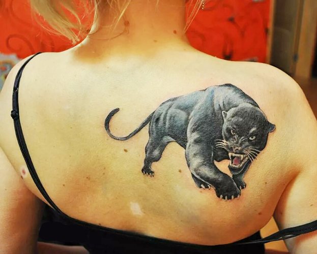 Tatouage panthère pour filles. Signification, photo, sur bras, jambe, épaule, dos, bas du dos