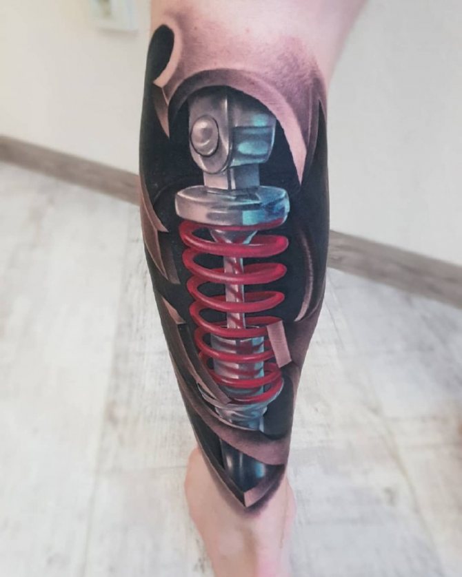 Tatouage d'un ressort sur la jambe