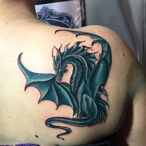 Tatouage d'un dragon. Photo, signification, croquis pour filles, hommes. Photo