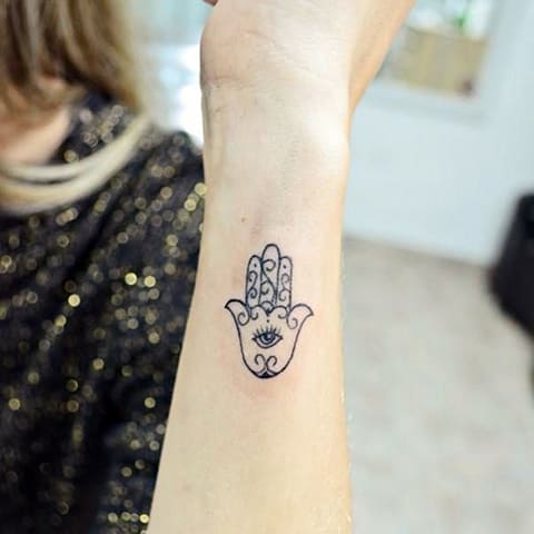 Tatouage du bras de Fatima