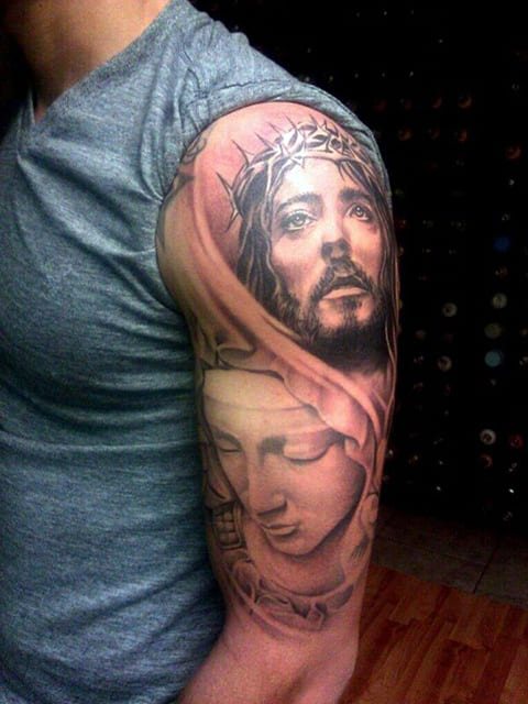 Tatouage de Jésus-Christ sur le bras