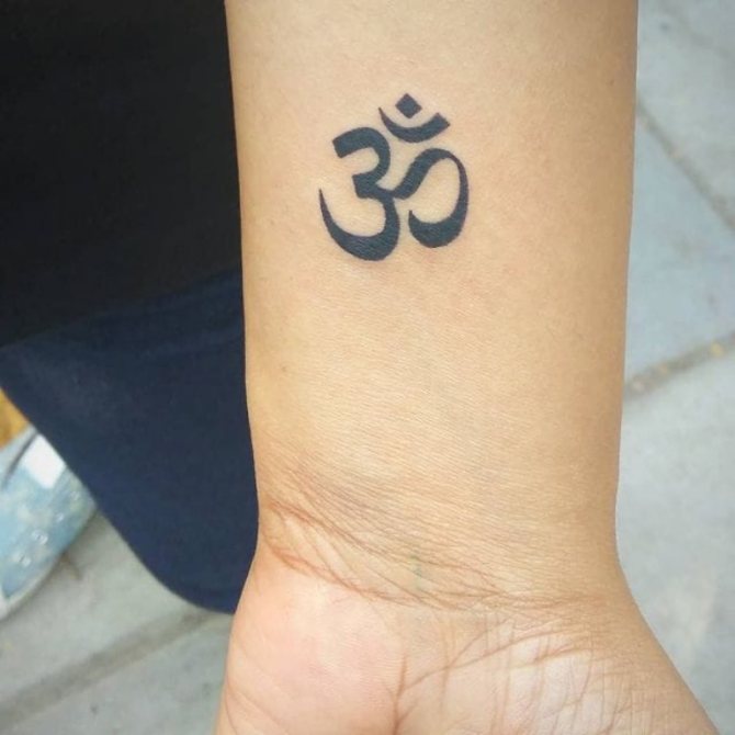 Tatouage signe om