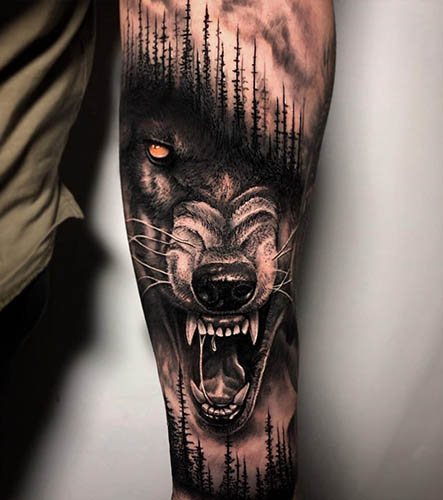 Un tatouage de sourire de loup. Photo, signification sur l'épaule, l'avant-bras, le dos, le bras