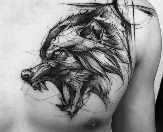Un tatouage de sourire de loup. Photo, signification sur l'épaule, l'avant-bras, le dos, le bras