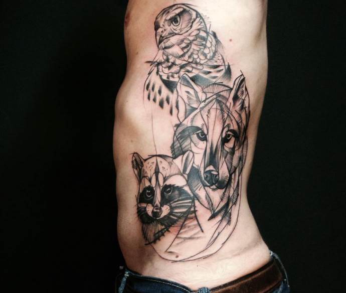 tatouage de loup, raton laveur et hibou