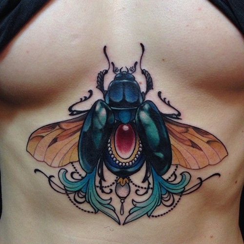 Tatouage de scarabée. Signification, croquis, photos sur les jambes, les bras, le poignet, le dos et le cou